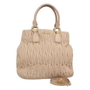 Pre Loved miu miu Women Beige Handbags